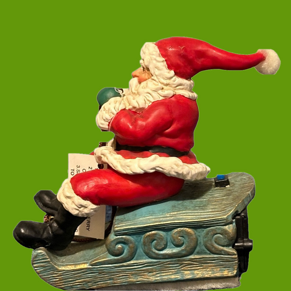 Other - Musical vibrating Santa on his sleigh. Plays 3 songs!